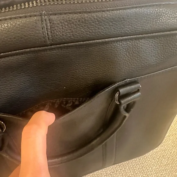 Black Leather Briefcase with Pebbled Texture and Structured Design